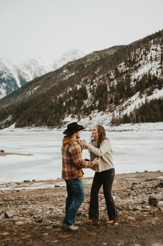Surprise Montana Proposal in Northwest Montana | Western Engagement Outfit Inspiration | Western Photographer| Snowy Mountain Proposal |