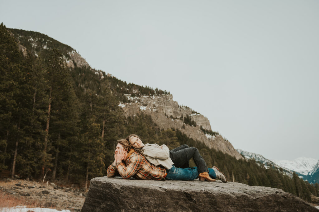 Surprise Montana Proposal in Northwest Montana | Western Engagement Outfit Inspiration | Western Photographer| Snowy Mountain Proposal | Engagement ring | Ranch Water | Montana Brewing Company